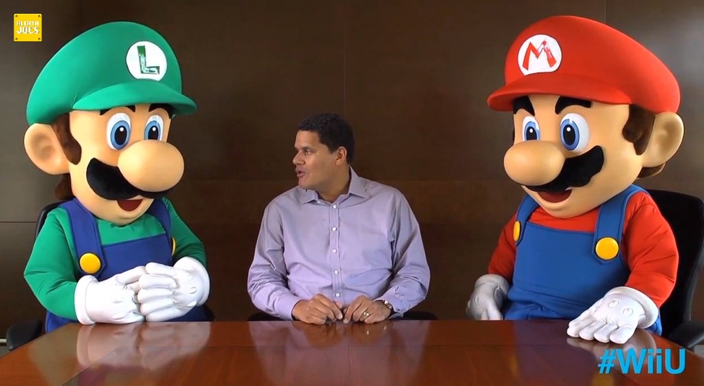 Reggie Fils-Aime with Mario and Luigi